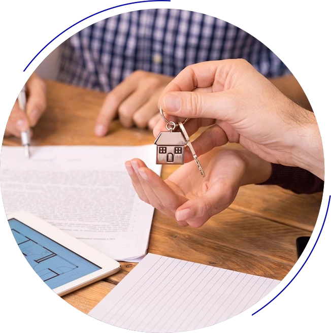 A person holding keys to another person 's house.